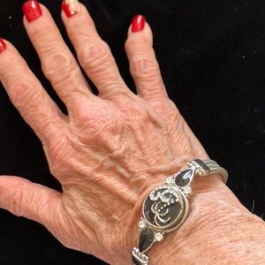 Silver and black palm tree bracelet